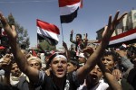 Anti-government protesters shout slogans during a protest demanding the ouster of Yemen's President Ali Abdullah Saleh outside Sanaa